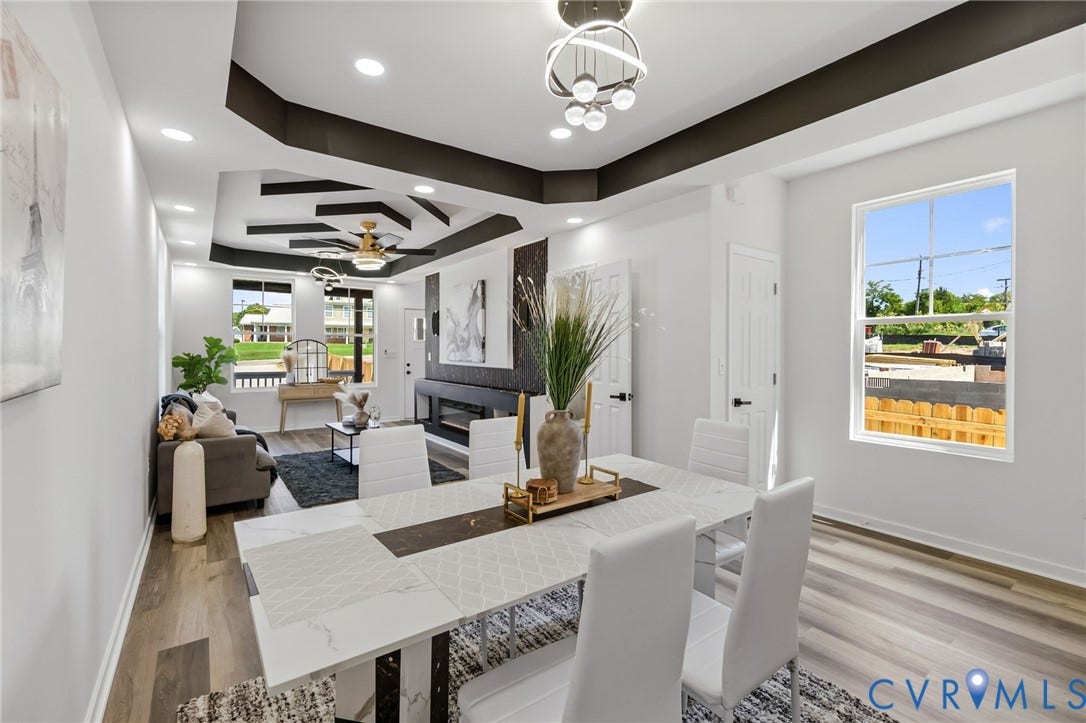 516 S South Street, Myers, Petersburg, VA 23803 Tray ceiling with recessed lighting and a decorative ceiling fan