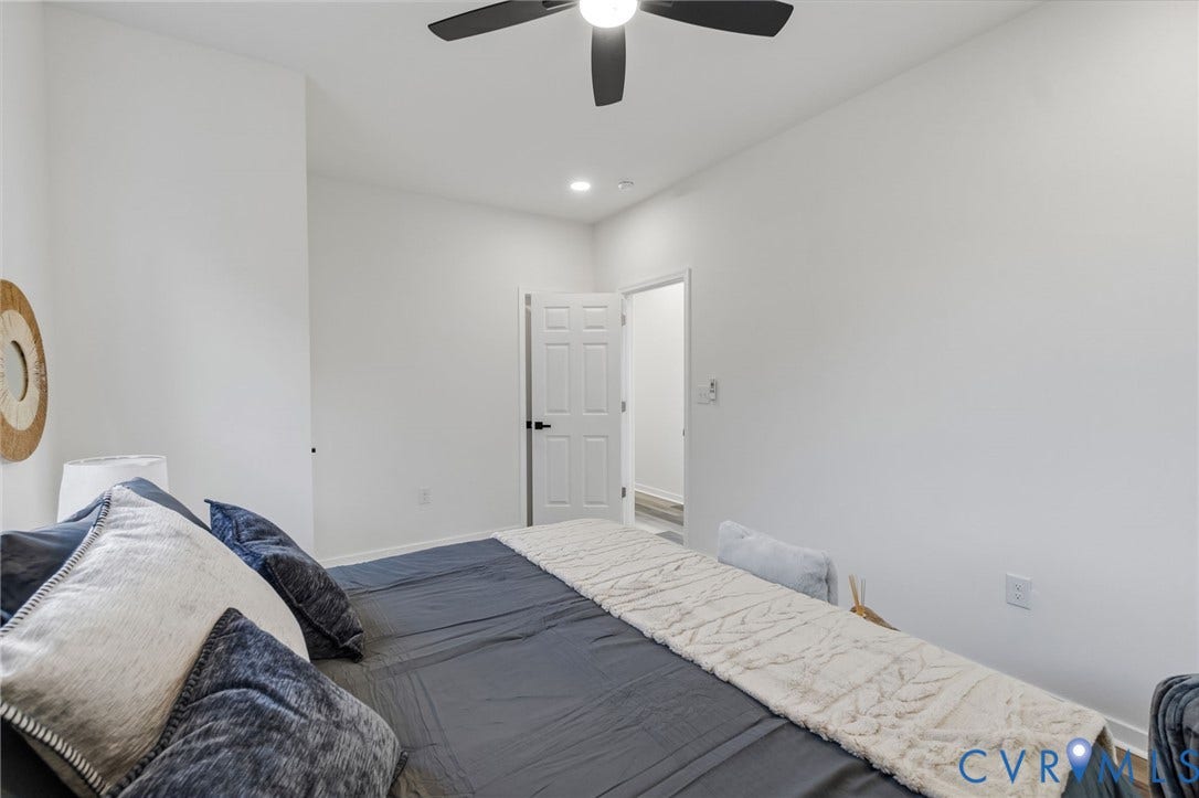 516 S South Street, Myers, Petersburg, VA 23803 Recessed lighting, ceiling fan, white paneled door, and light-tone walls