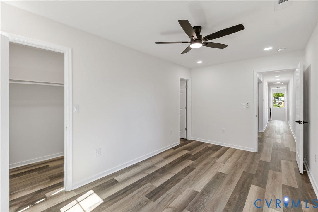 516 S South Street, Myers, Petersburg, VA 23803 Wood-finish flooring, recessed lighting, and a contemporary ceiling fan