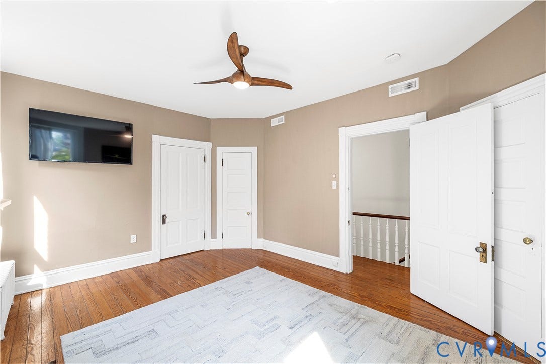 109 N Morris Street, The Fan, Richmond, VA 23220 Hardwood flooring, ceiling fan, and white trim accents