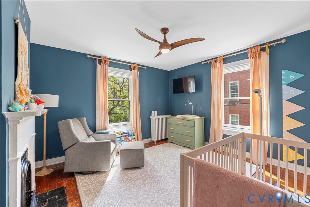 109 N Morris Street, The Fan, Richmond, VA 23220 Hardwood flooring and a decorative fireplace with a mantel