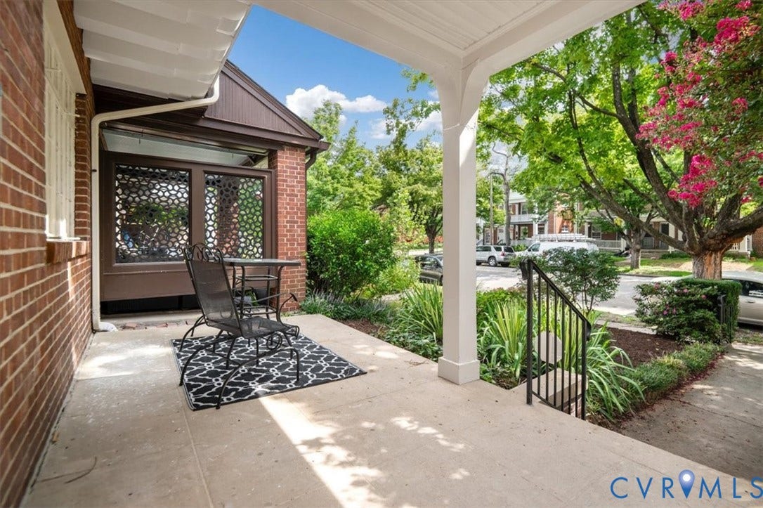 3510 Hanover Avenue, Museum District, Richmond, VA 23221 Covered porch with concrete flooring, brick exterior, decorative screen door, and black metal railing