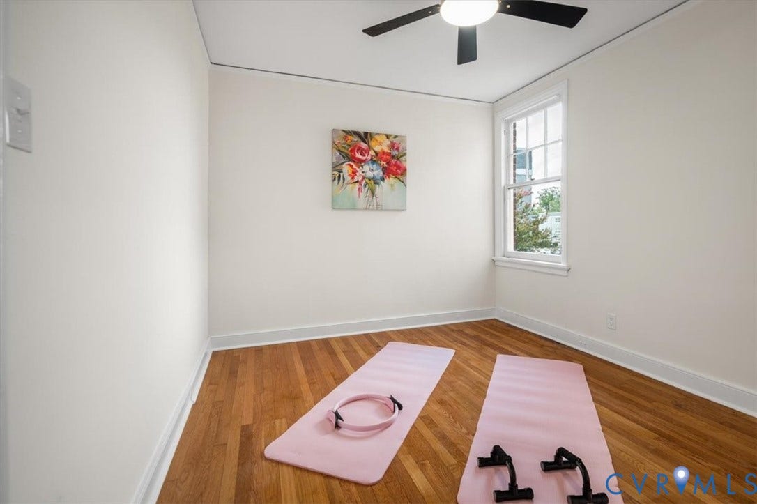 3510 Hanover Avenue, Museum District, Richmond, VA 23221 Hardwood flooring, painted walls, ceiling fan with integrated lighting, and a double-hung window