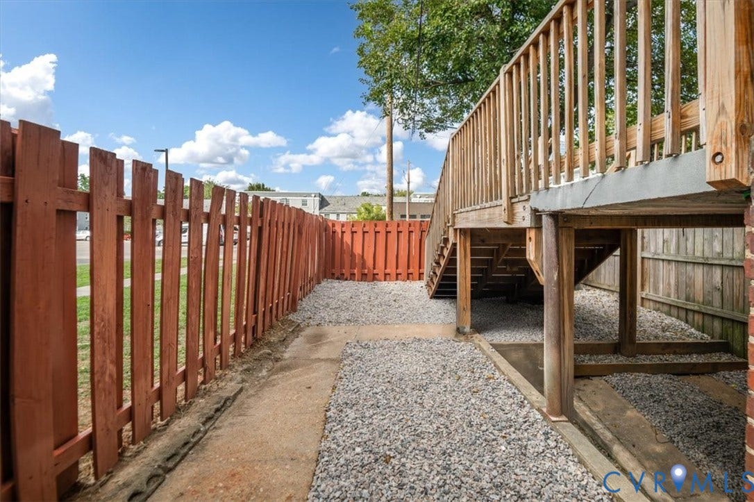 3510 Hanover Avenue, Museum District, Richmond, VA 23221 Wood privacy fencing and a multi-level wood deck with stairs
