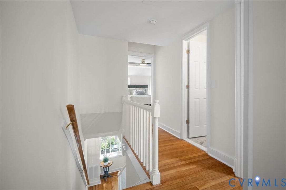 3510 Hanover Avenue, Museum District, Richmond, VA 23221 Hardwood flooring, painted white balusters, and a solid wood handrail