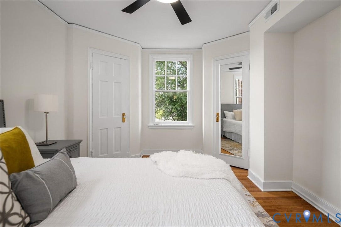 3510 Hanover Avenue, Museum District, Richmond, VA 23221 Hardwood-finish flooring, white paneled doors, ceiling fan, and trim details
