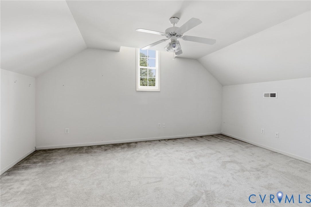 3173 Poplar View Place, Ashley Forest, Chester, VA 23831 Attic room with sloped ceilings, a single window, and a white ceiling fan