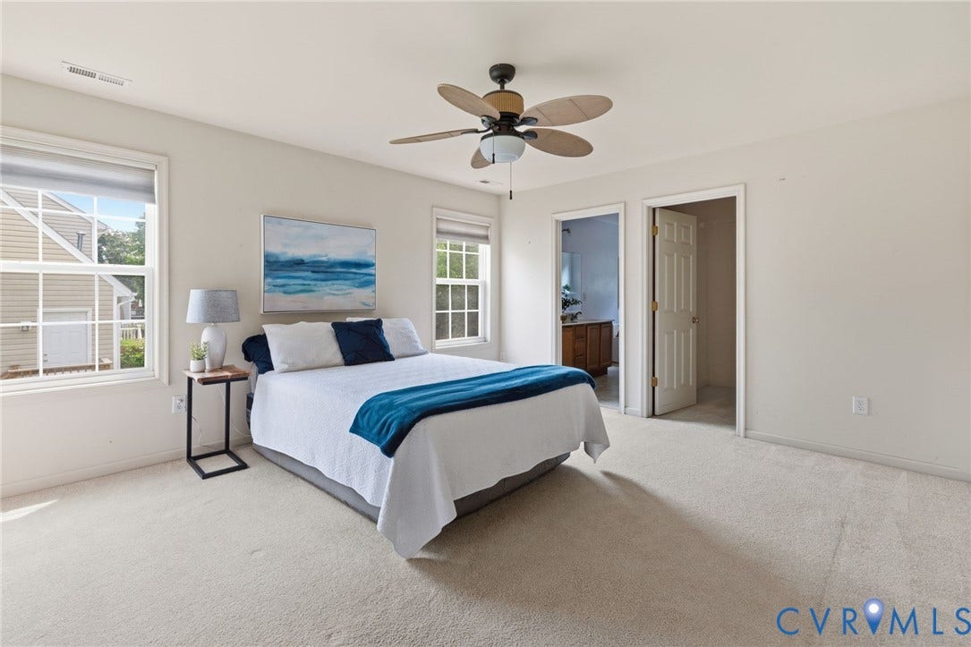 3173 Poplar View Place, Ashley Forest, Chester, VA 23831 Wall-to-wall carpeting, two windows, and a ceiling fan with integrated lighting