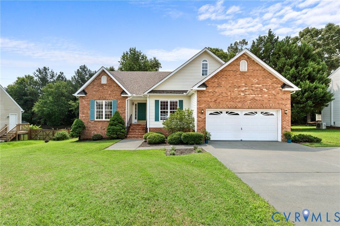 3173 Poplar View Place, Ashley Forest, Chester, VA 23831 Brick and siding exterior with a two-car garage