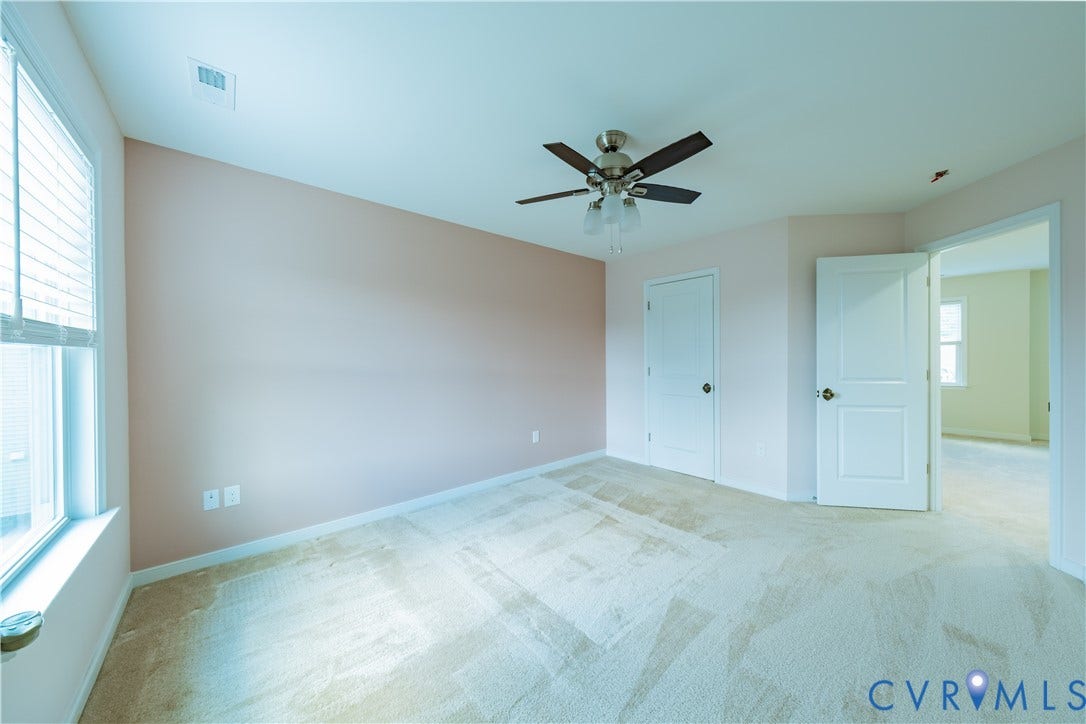 Recessed lighting, ceiling fan, carpeted flooring, window with blinds, interior doors
