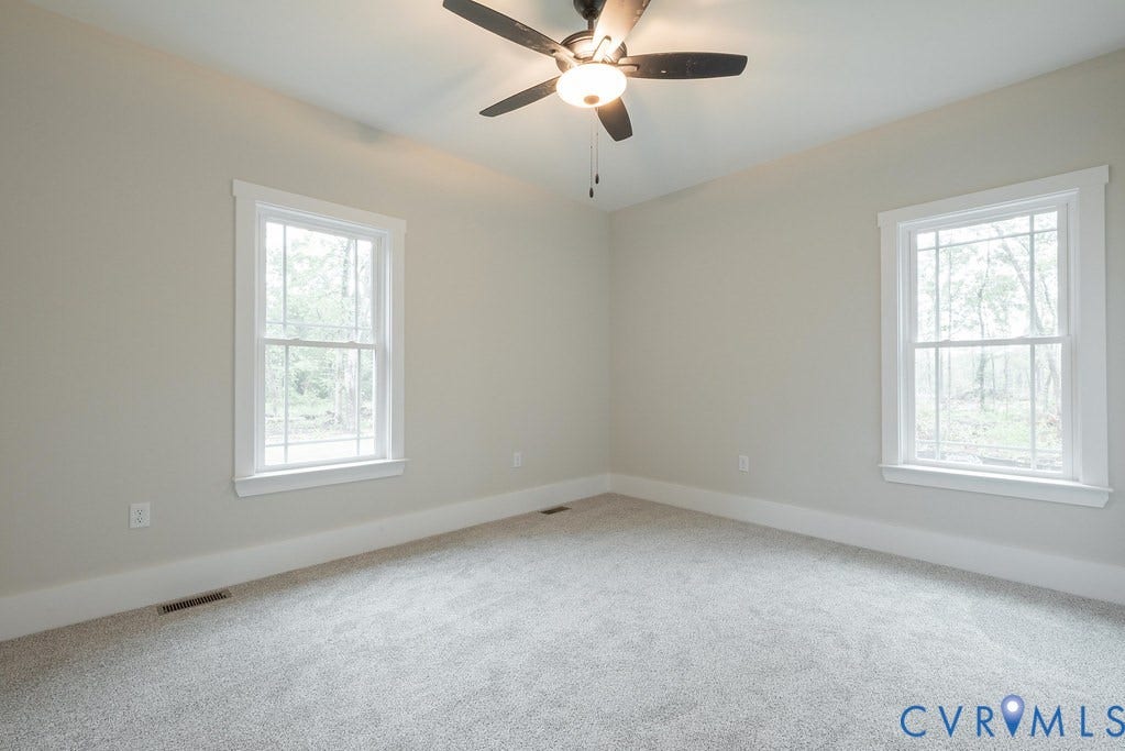 Lot 1A Tabscott Road, Columbia, VA 23038 Neutral-toned walls complementing plush carpeting