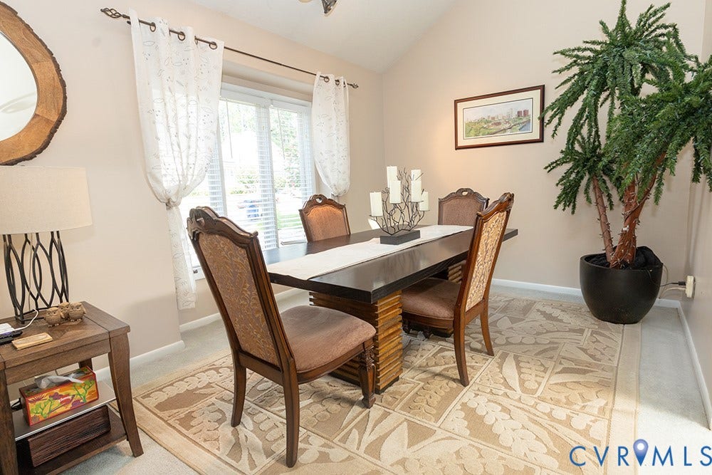 2209 Aspen Place, Henrico, VA 23233 Vaulted ceiling, window with white blinds, neutral wall paint, and wood-finish flooring