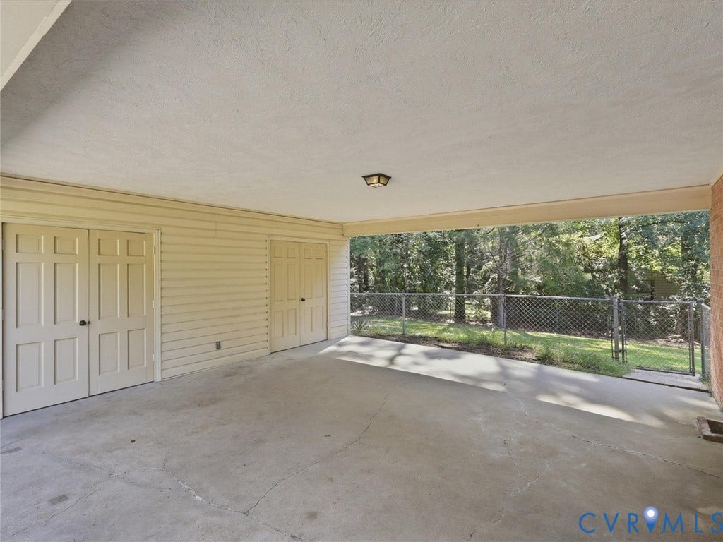 2301 Raymond Avenue, Henrico, VA 23228 Private drive with carport and extra storage!
