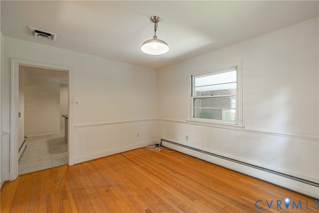 4532 Arrowhead Road, Statford Hills / Oxford, Richmond, VA 23235 Hardwood flooring, painted walls, chair rail molding, single-hung window, and a ceiling-mounted light fixture