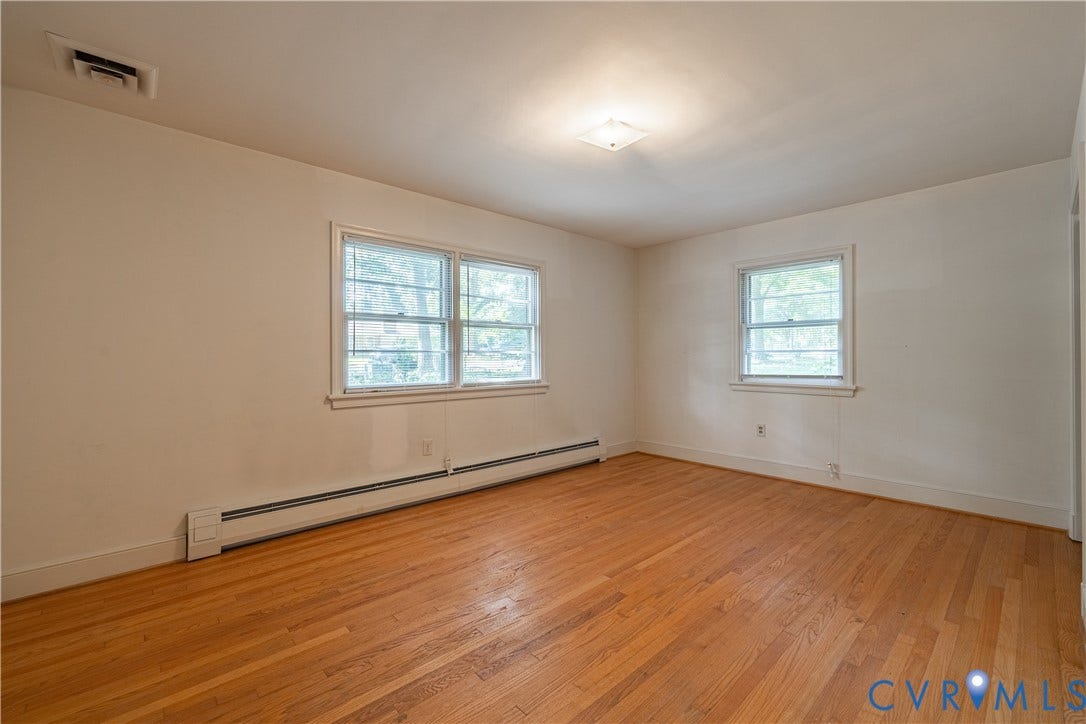 4532 Arrowhead Road, Statford Hills / Oxford, Richmond, VA 23235 Wood-finish flooring, multiple windows, overhead lighting, and neutral wall tones