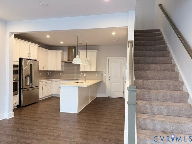 4113 Greybull Drive, #A, Gateway Square, Henrico, VA 23233 Open-concept kitchen with white cabinetry, stainless steel appliances, and a central island