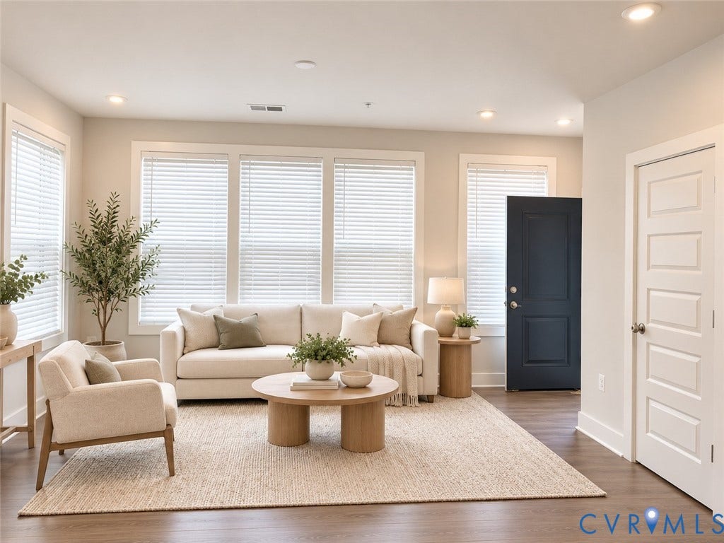 4113 Greybull Drive, #A, Gateway Square, Henrico, VA 23233 Virtually staged. Open-concept living space with recessed lighting, wood-finish flooring, and multiple windows