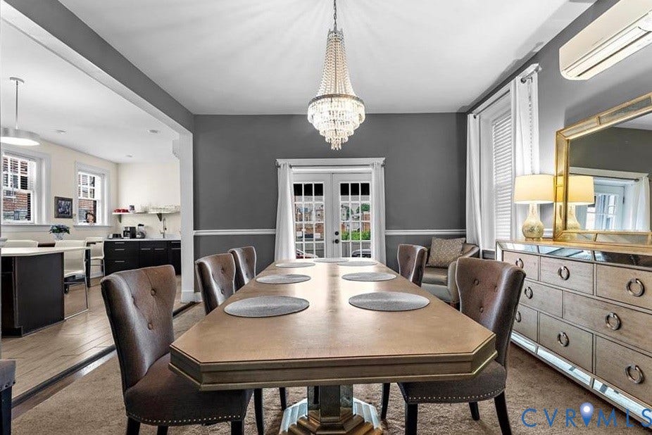 710 N Arthur Ashe Boulevard, Historic Fan District, Richmond, VA 23220 Interior space featuring a crystal chandelier, French doors, crown molding, and a wide entryway