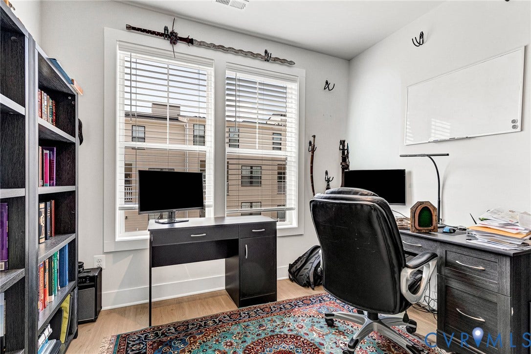 528 Greybull Walk, #B, Glen Allen, VA 23233 Light wood-finish flooring with white walls and dual windows