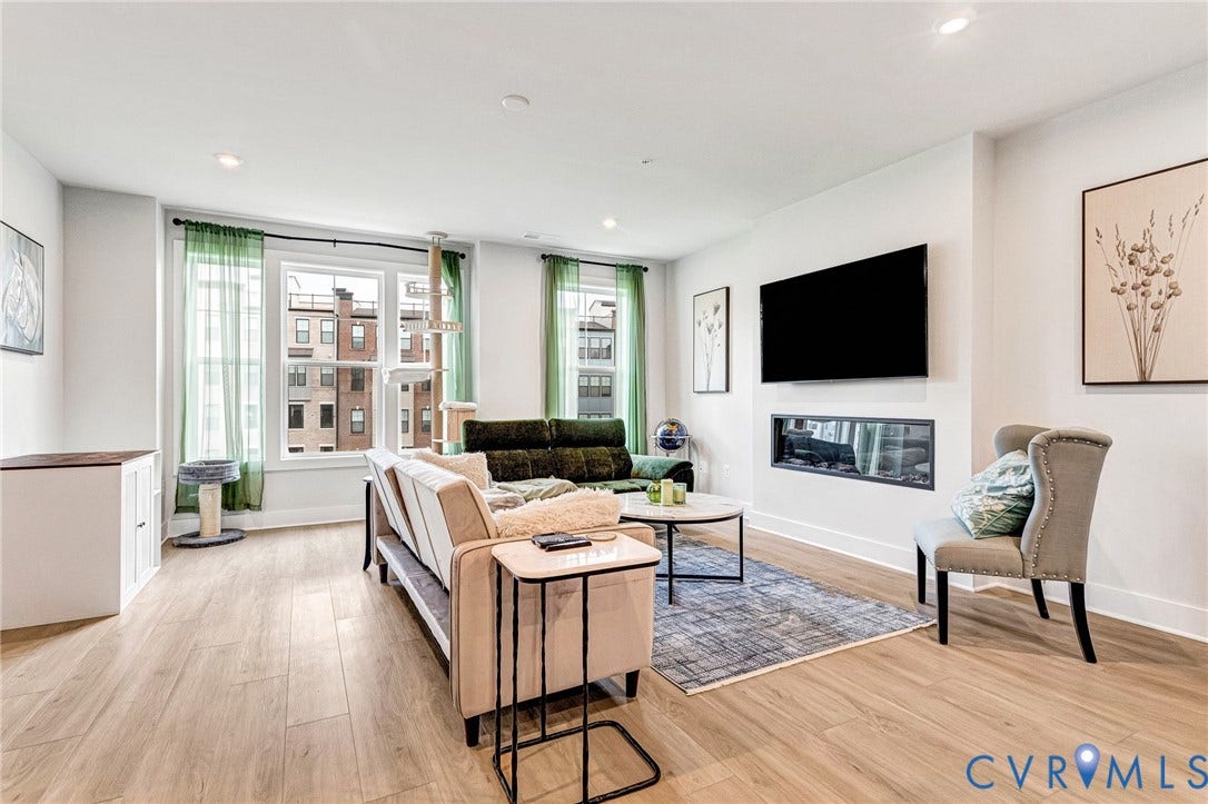 528 Greybull Walk, #B, Glen Allen, VA 23233 Recessed lighting, wood-finish flooring, multiple windows, built-in linear fireplace, and white walls