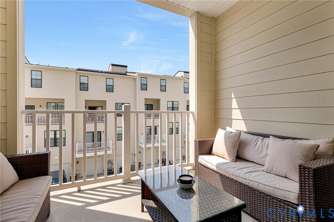 528 Greybull Walk, #B, Glen Allen, VA 23233 Covered outdoor balcony with a light-colored siding exterior