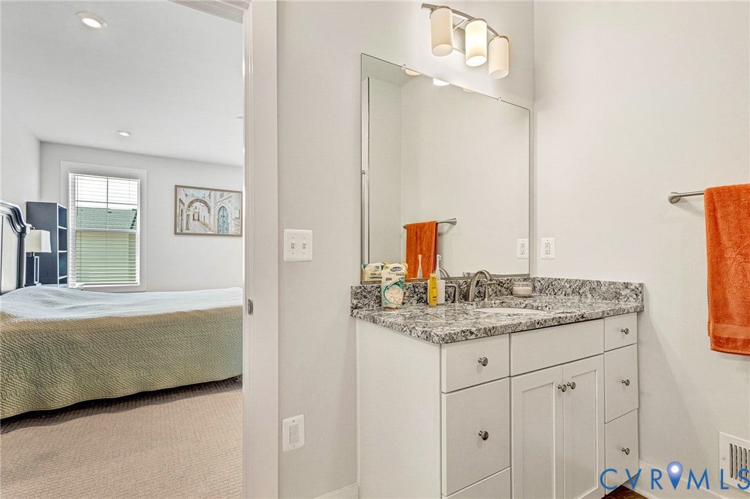 528 Greybull Walk, #B, Glen Allen, VA 23233 Single vanity with a light-colored countertop, undermount sink, and polished chrome faucet