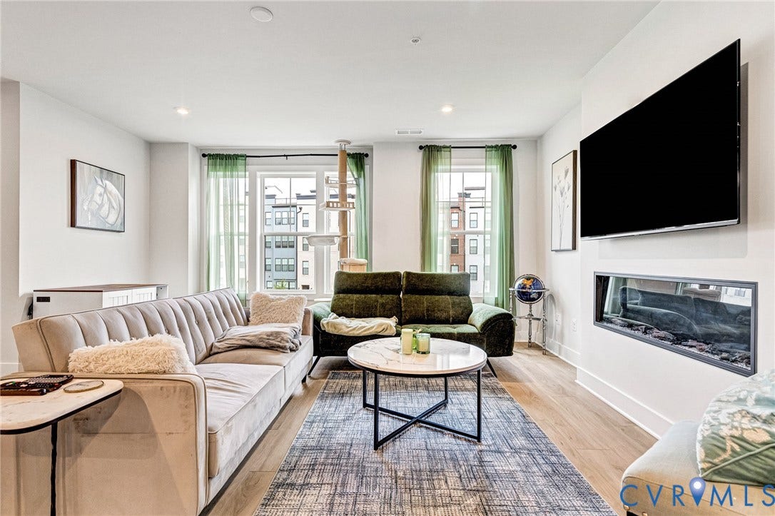 528 Greybull Walk, #B, Glen Allen, VA 23233 Recessed lighting, wood-finish flooring, and a built-in linear electric fireplace