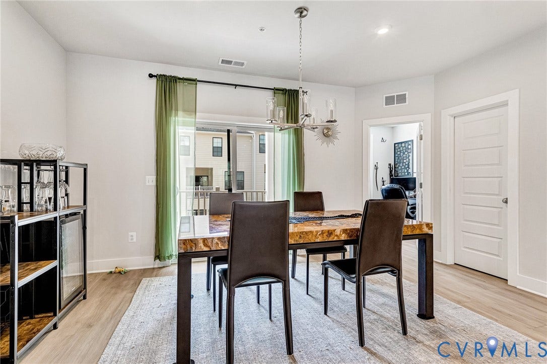 528 Greybull Walk, #B, Glen Allen, VA 23233 Wood-finish flooring with a neutral area rug