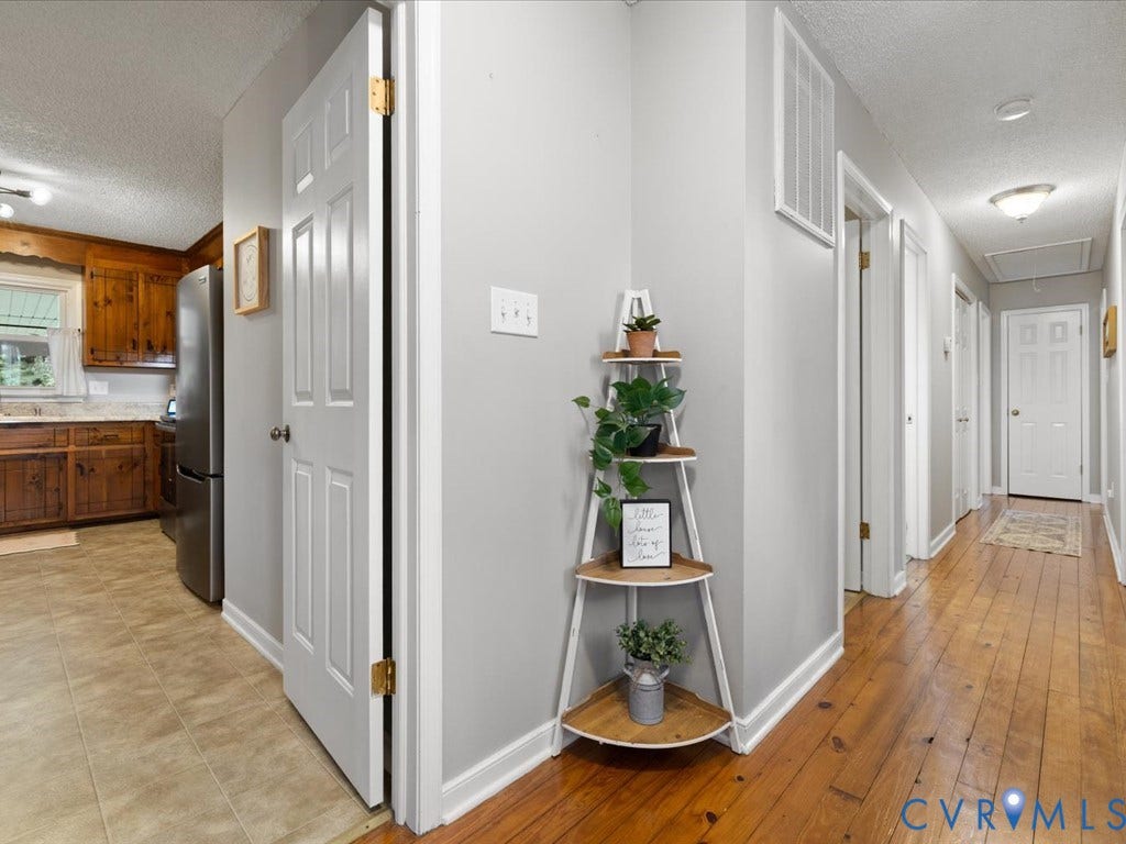 12724 S Chester Road, Chesterfield, VA 23831 Wood-finish flooring throughout the hallway