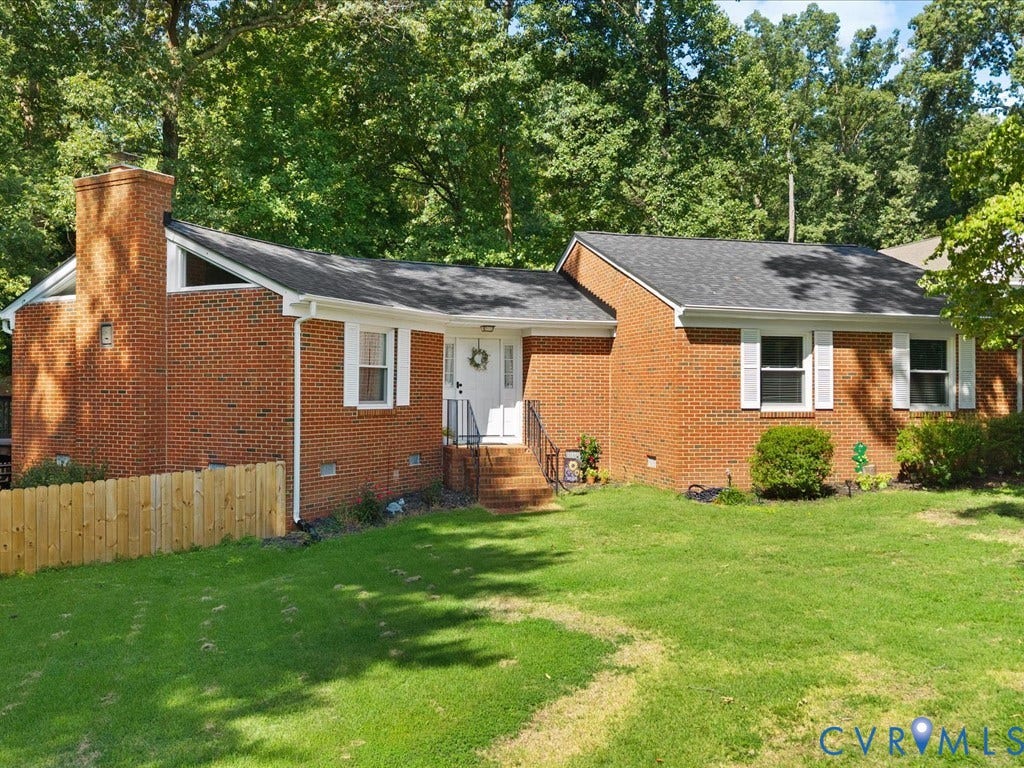12724 S Chester Road, Chesterfield, VA 23831 Brick exterior featuring a gabled roof and white window shutters