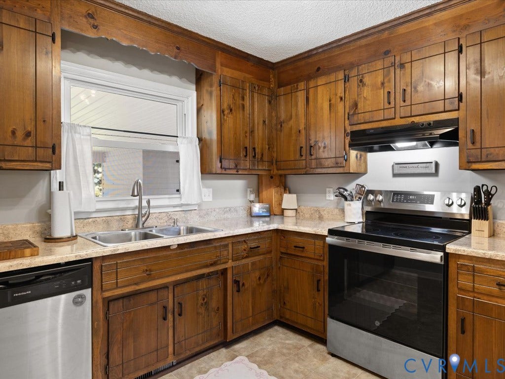 12724 S Chester Road, Chesterfield, VA 23831 Kitchen featuring window over the sink, a stainless steel dishwasher, a stainless stove, and light-toned countertops