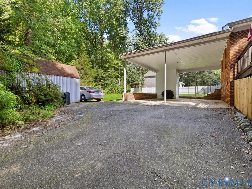12724 S Chester Road, Chesterfield, VA 23831 Paved driveway leading to a covered carport