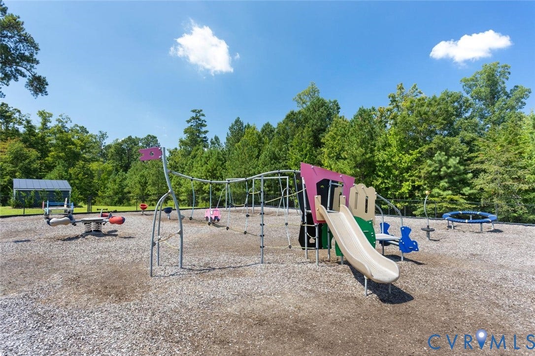 Featuring a community playground area.