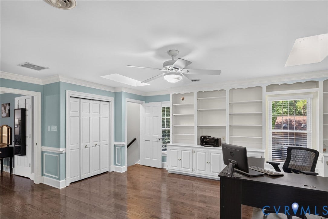 12800 Leffingwell Court, Henrico, VA 23233 Hardwood flooring, crown molding, built-in shelving, ceiling fan with light, and multiple windows
