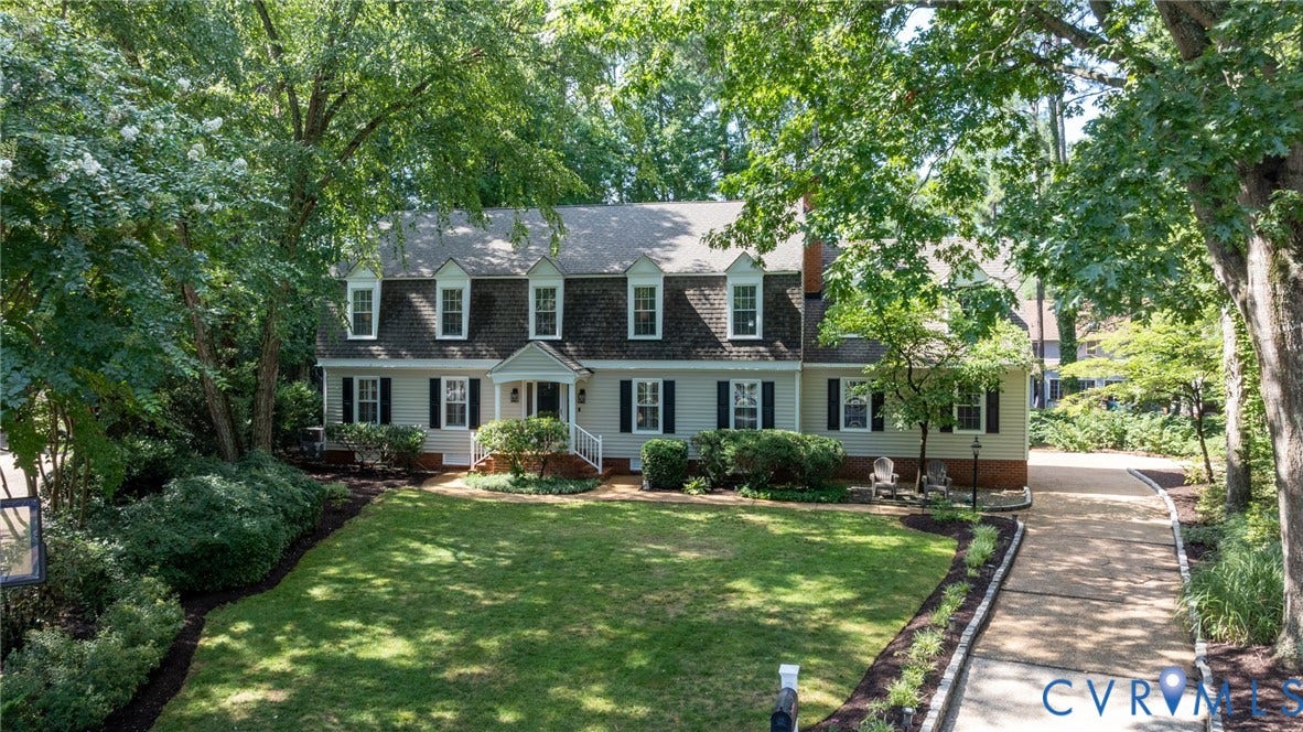 12800 Leffingwell Court, Henrico, VA 23233 Dormer windows, white siding, black shutters, covered front entry, and a paved driveway