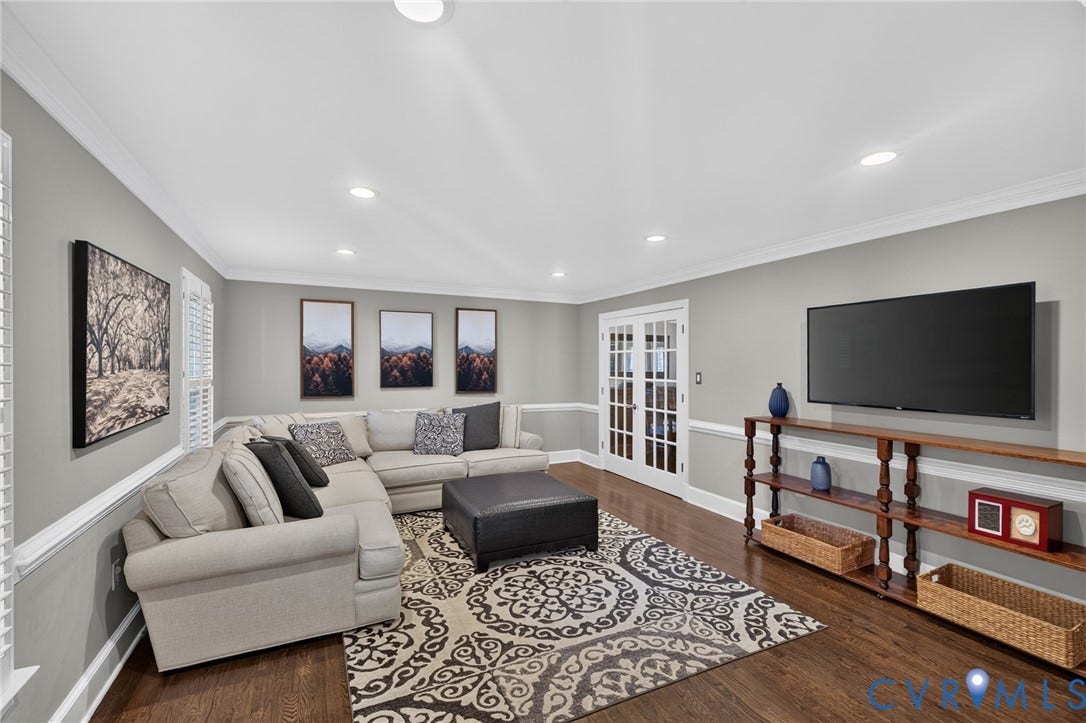 12800 Leffingwell Court, Henrico, VA 23233 Recessed lighting, crown molding, wood-finish flooring, half-lite French doors, and a wall-mounted console