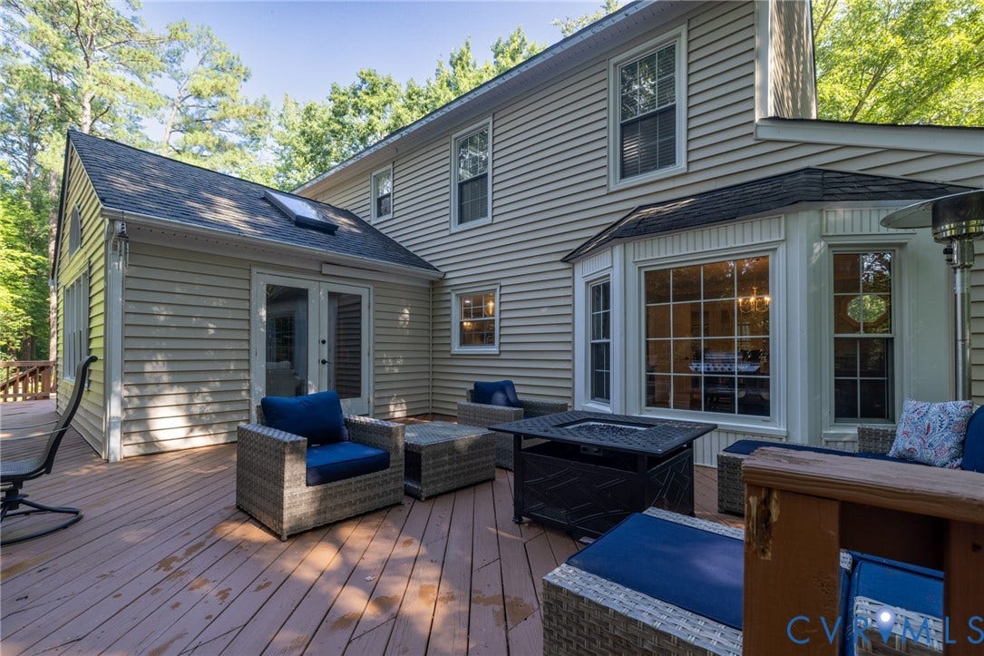 12800 Leffingwell Court, Henrico, VA 23233 Expansive wood deck with a bay window, double glass doors, and a skylight