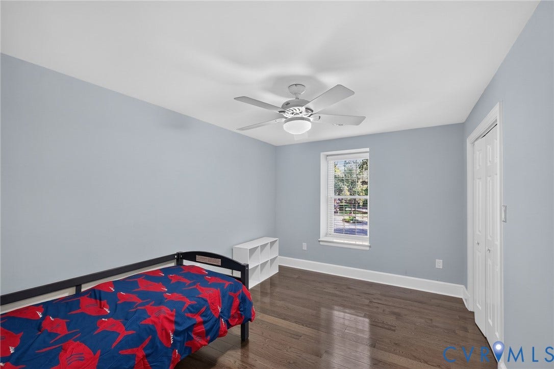 12800 Leffingwell Court, Henrico, VA 23233 Wood-finish flooring, ceiling fan with integrated lighting, white trim, and a window with exterior visibility