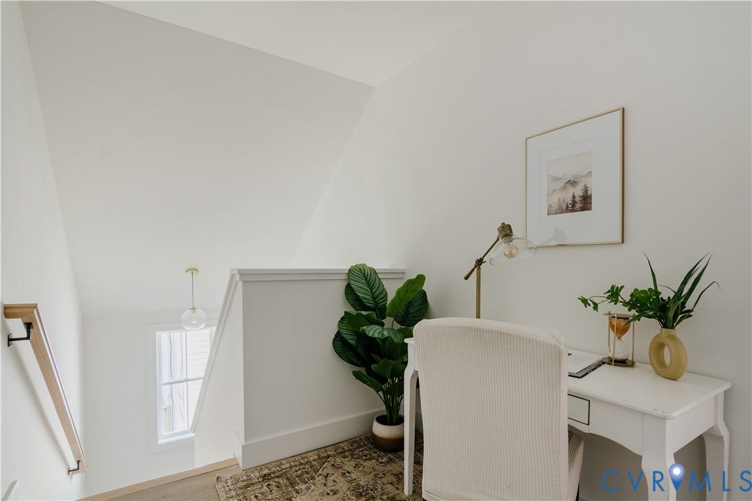 3106 Groveland Avenue, Richmond, VA 23222 White painted walls, wood-finish flooring, and a single-pane window with trim