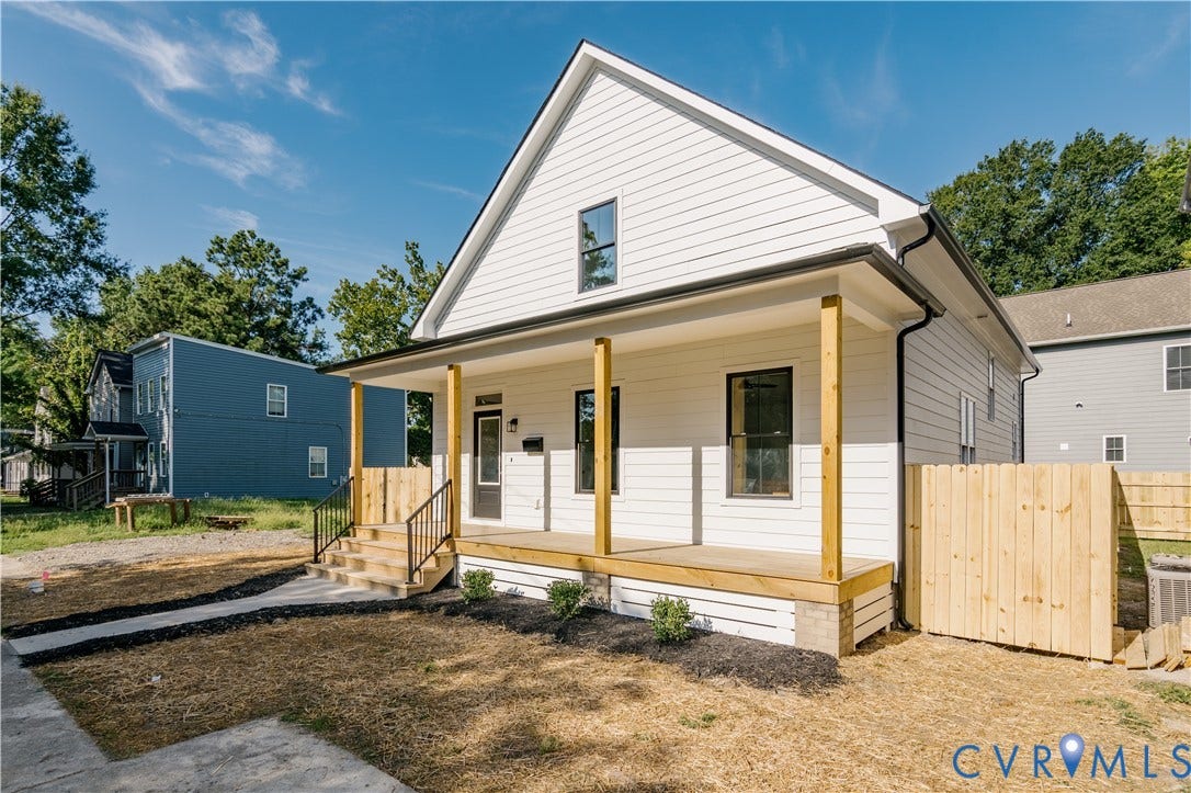 3106 Groveland Avenue, Richmond, VA 23222 Modern farmhouse exterior with white horizontal siding and black-trimmed windows