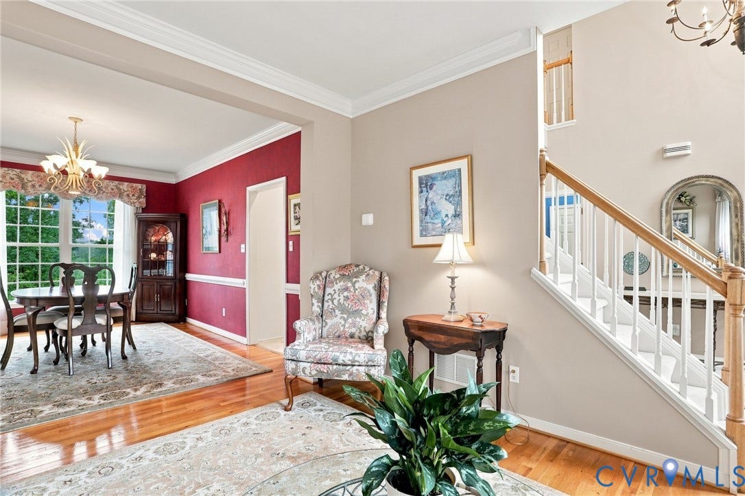 5712 Stephens Point Court, Stephens Point, Chester, VA 23831 Open sightlines between the living and dining rooms create an inviting flow for everyday living and entertaining.