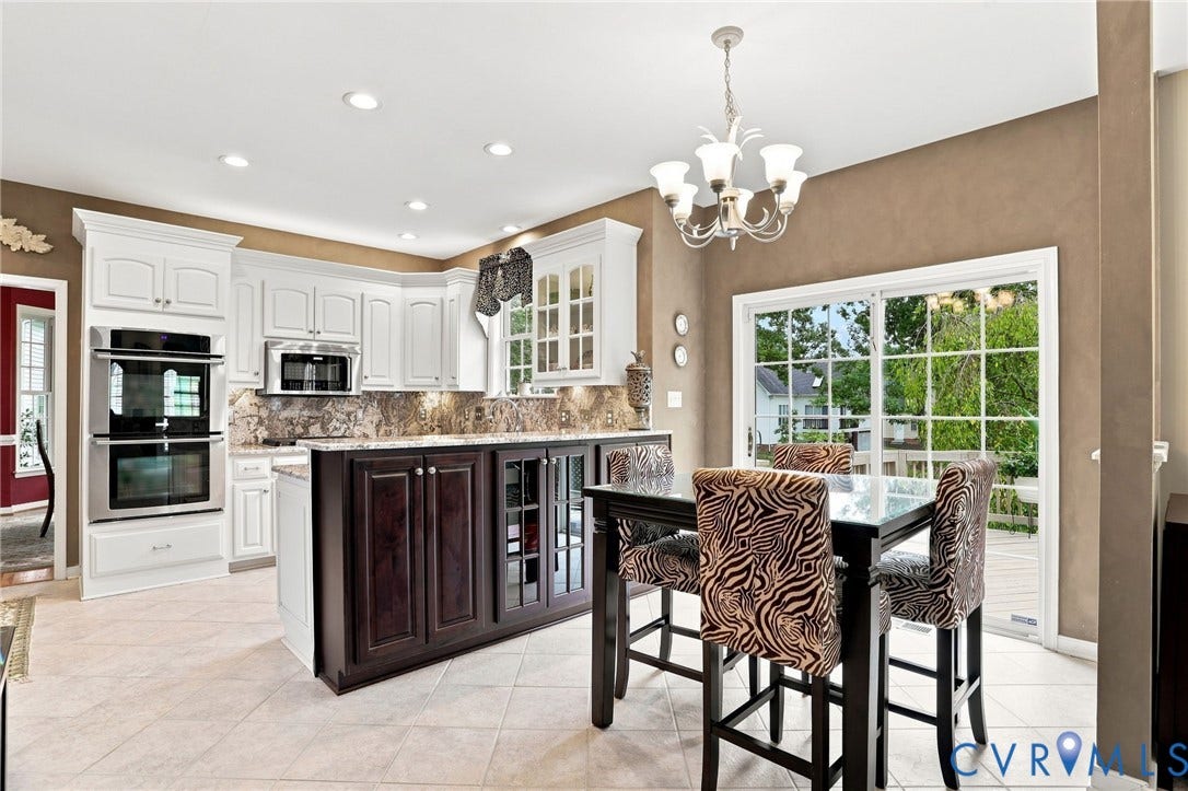 5712 Stephens Point Court, Stephens Point, Chester, VA 23831 Open kitchen and breakfast area offer plenty of space for everyday dining.