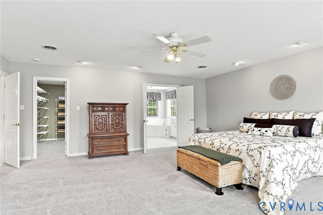 5712 Stephens Point Court, Stephens Point, Chester, VA 23831 Another view highlights the generous proportions of the primary suite, along with a walk-in closet and en-suite bath.