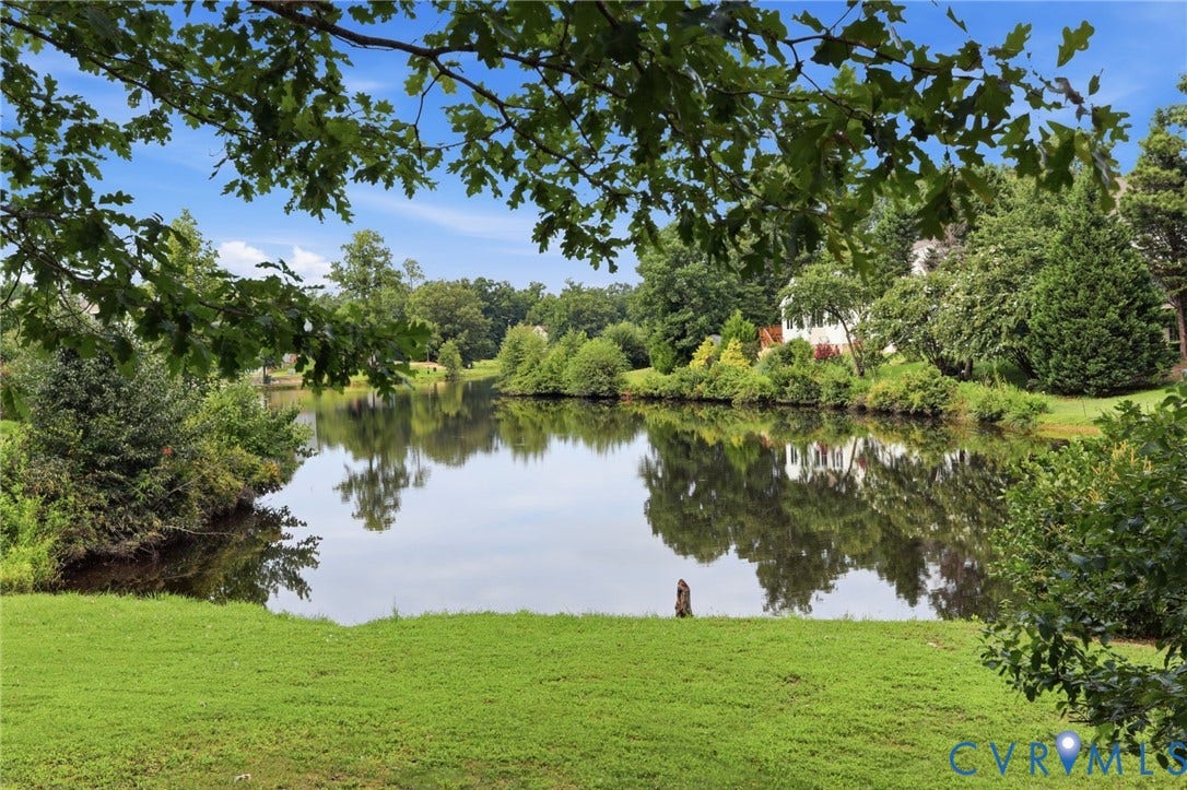 5712 Stephens Point Court, Stephens Point, Chester, VA 23831 This serene lake view can be your everyday life.