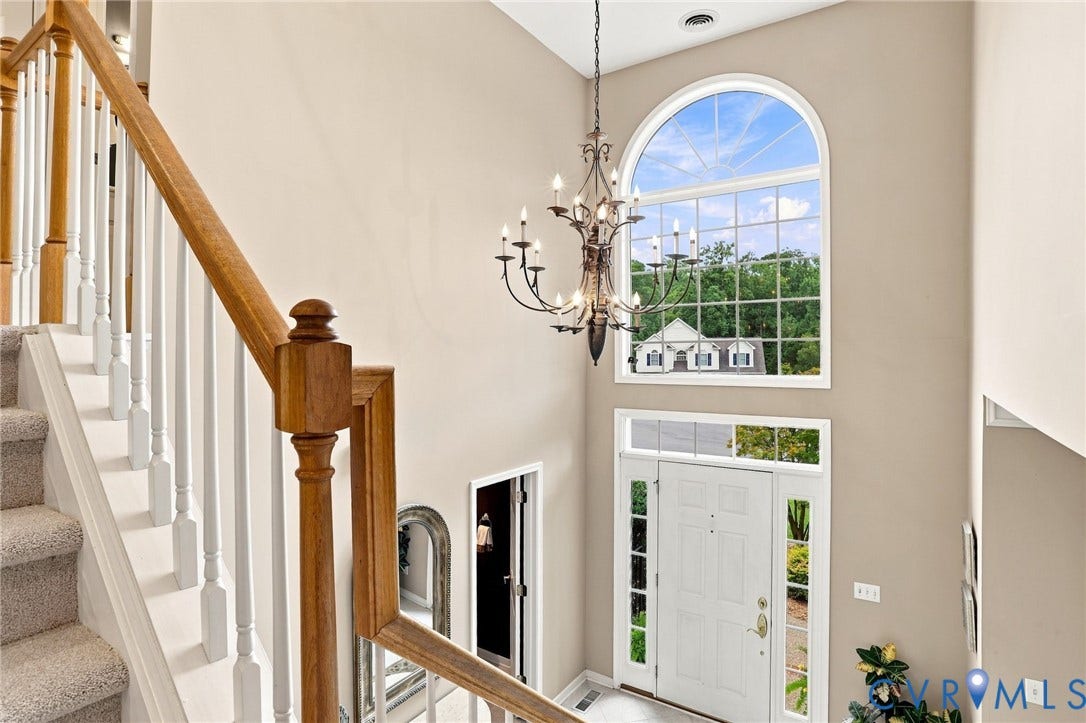5712 Stephens Point Court, Stephens Point, Chester, VA 23831 Dramatic two-story foyer features an oversized arched window that fills the entry with natural light.