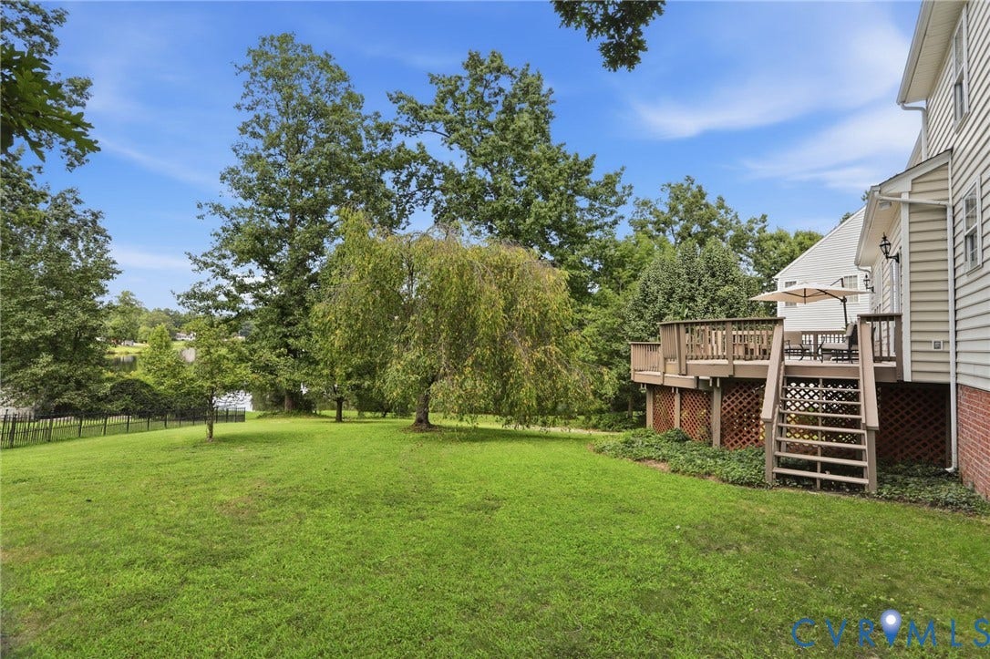 5712 Stephens Point Court, Stephens Point, Chester, VA 23831 Generous backyard offers plenty of green space.