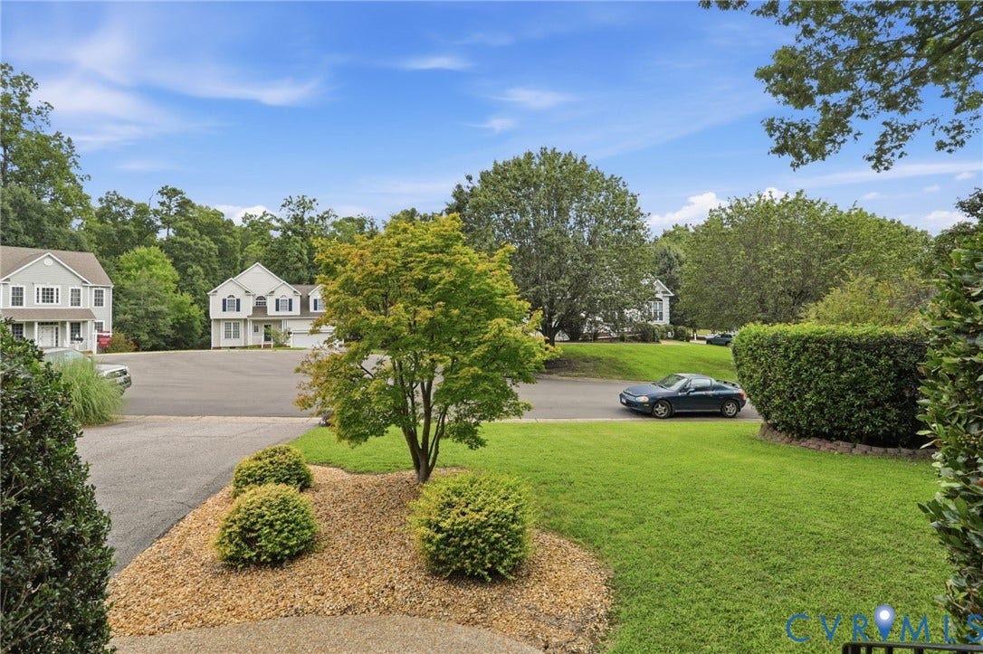 5712 Stephens Point Court, Stephens Point, Chester, VA 23831 Well-maintained front lawn and landscaping complement the homes attractive neighborhood setting