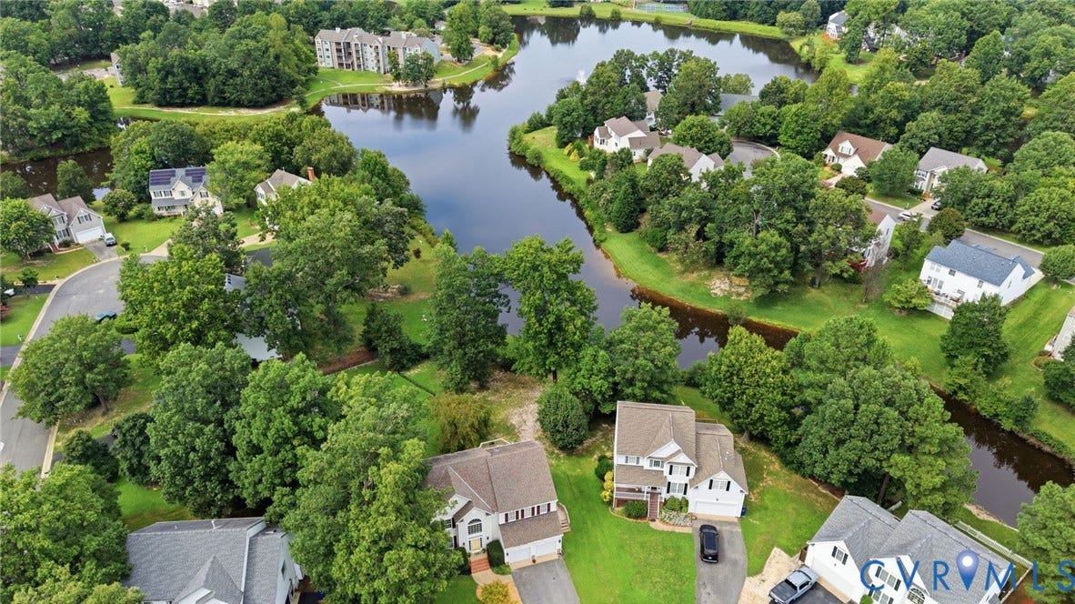5712 Stephens Point Court, Stephens Point, Chester, VA 23831 Aerial view showcases the homes beautiful setting within the neighborhood and its proximity to the scenic pond.
