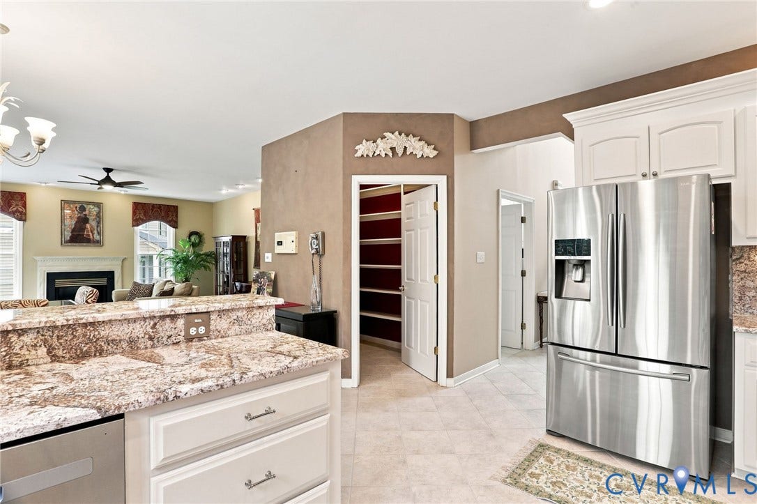 5712 Stephens Point Court, Stephens Point, Chester, VA 23831 Open kitchen offers generous counter space, a pantry, and easy flow into the family room.