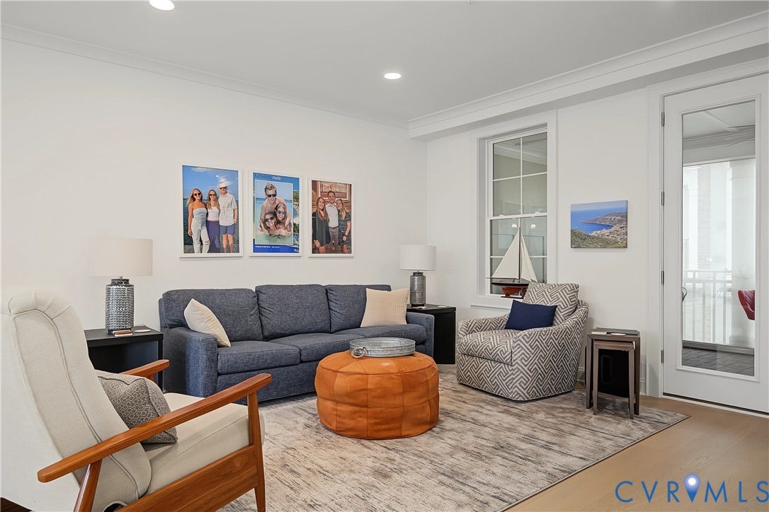 Recessed lighting, crown molding, wood-finish flooring, French door, and a multi-pane window